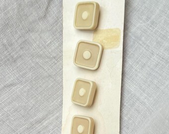 4 Vintage Beige and White Plastic Buttons by Schwanda