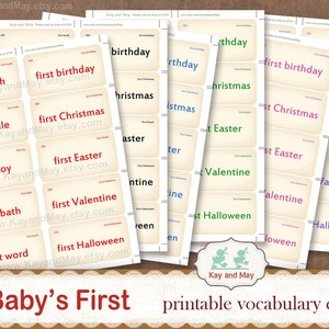 May include: Printable vocabulary cards for babies featuring the phrase "Baby's First" with various milestones such as first tooth, first birthday, first Christmas, first Easter, first Valentine, first Halloween, and first word. The cards are printed on a cream-colored background with red, green, purple, and blue text.