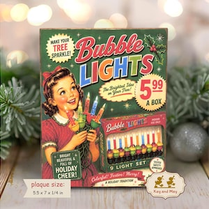 May include: A rectangular plaque measuring 5.5 x 7 x 1/4 inches featuring vintage-style artwork of a child holding colorful bubble lights. The text reads Bubble Lights, Make Your Tree Sparkle!, The Brightest Idea on Your Tree!, 5.99 A Box, and Bright Beautiful & Full of Holiday Cheer!.