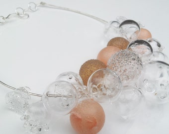 Crystal, salmon,  dark gold glass necklace