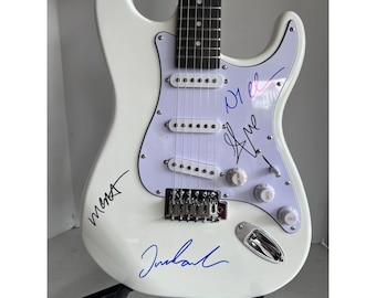 Arctic Monkeys Stratocaster electric guitar signed with proof