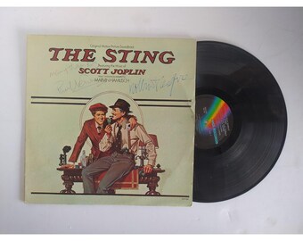 ロバート・レッドフォードとポール・ニューマンのサイン入り写真