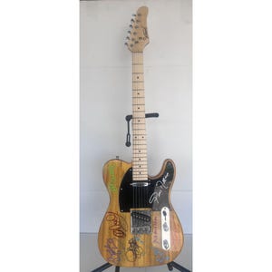 Gregg Allman, Dickey Betts, Wayne Haynes, The Allman Brothers Telecaster electric guitar signed with proof