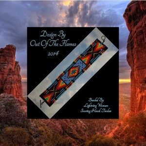 May include: A beaded bracelet with a geometric design in shades of blue, orange, yellow, and black. The bracelet is made by Lightning Woman, Soaring Hawk Traders. The design is by Out of the Flames, 2014.
