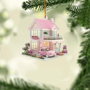 May include: A pink miniature dollhouse ornament with a white picket fence, a pink car, and a sign that says "Home".