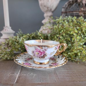 Vintage floral teacup candle and saucer