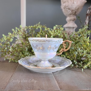 Vintage floral teacup candle and saucer