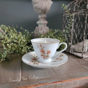 Vintage floral teacup candle and saucer