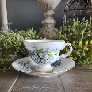 Vintage floral teacup candle and saucer