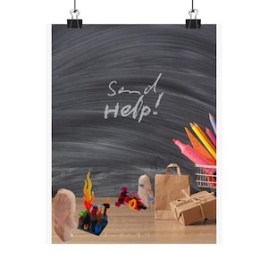 May include: A poster with a chalkboard background and the words "Send Help!" written in white chalk. The poster features a variety of small objects, including a shopping cart with colored pencils, a paper bag, and a wrapped gift.