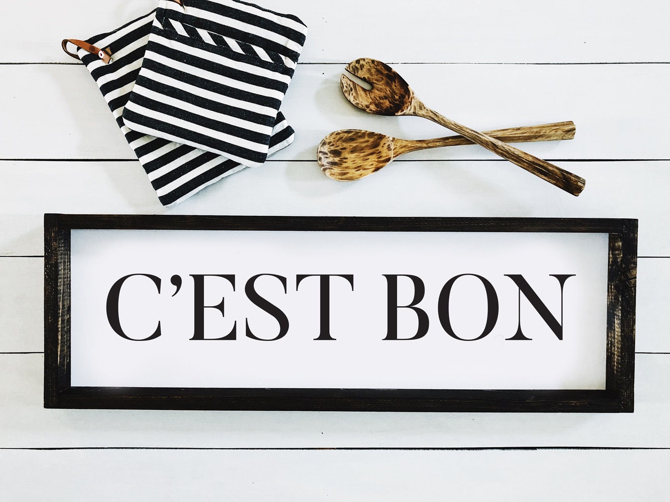 C'est Bon French farmhouse sign in black and white for your French inspired kitchen and 25 Beautifully Handmade Decor Finds for Home to help you feather your nest and also inspire your interior design schemes.