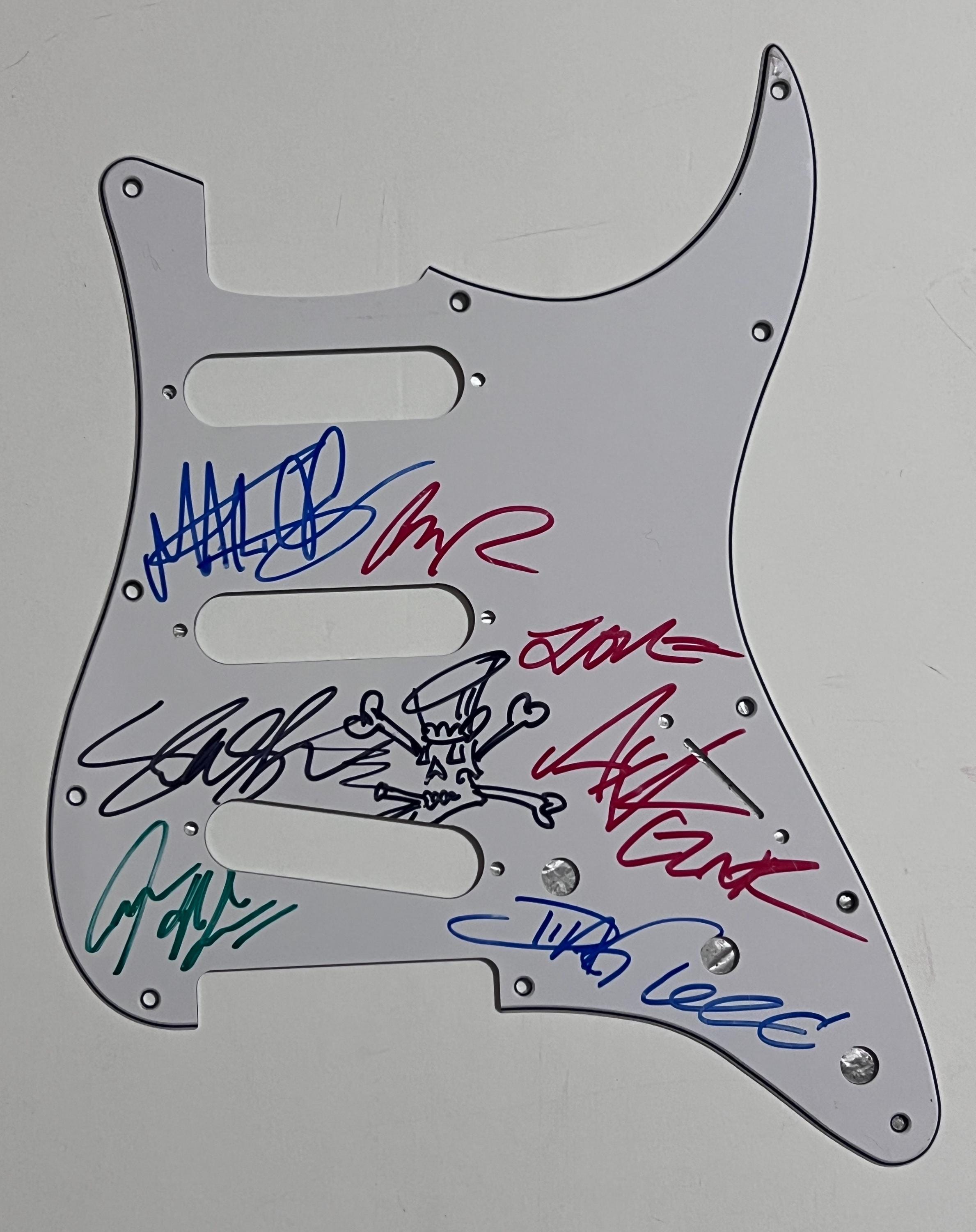 Stratocaster guitar pickguard signed by the band G N R