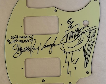 Vintage guitar pickguard signed by Stevie Ray Vaughan