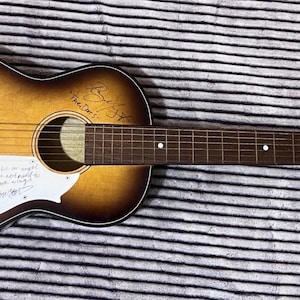 Vintage acoustic guitar signed by Jim Morrison, Ray Manzarek, Robbie Krueger, John Densmore, and The Doors