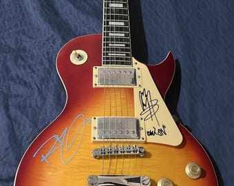 Les Paul type electric guitar signed by the band Led Zeppelin