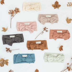 Comparison table of best organic headbands for newborns with price, material, and size