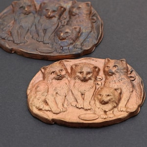 2 pcs large oval kitten scene stampings, vintage flat kitty faces, cats and saucer of milk, 2 inches long