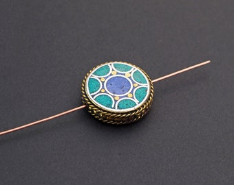 Flat round stone inlaid bead, mixed metal turquoise and lapis, brass and silver tones, base metal, 22mm across