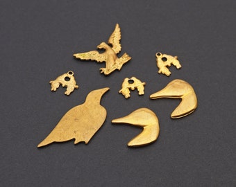 7 pcs small brass bird stampings, vintage assorted, duck head, lovebirds, eagle, assorted size