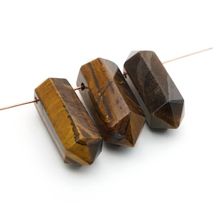 3 pcs long top drilled double terminated tigereye beads, yellow and brown semiprecious stone, length ranges 36mm to 39mm