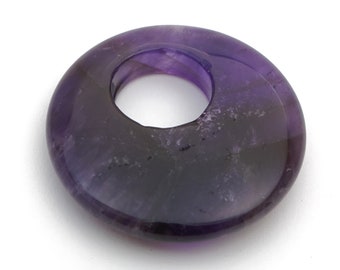 Purple amethyst donut pendant, flat round semiprecious stone with offset hole, 40mm across