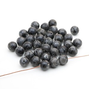 35 pcs round Norwegian moonstone beads, black grey silver flash, average size 10mm