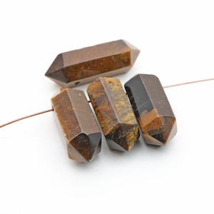 4 pcs long top drilled double terminated tigereye beads, yellow and brown semiprecious stone, length ranges from 35mm to 37mm