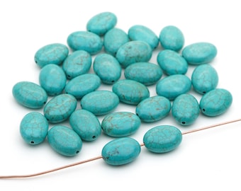 29 pcs flat oval dyed magnesite beads, closeout, light blue turquoise color semiprecious stone, average length 14mm