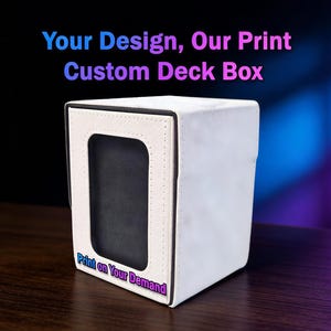 May include: A white custom deck box with a black interior and a rectangular window. The text "Your Design, Our Print Custom Deck Box" is at the top, and "Print on Your Demand" is at the bottom. The box is on a wooden surface.