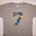 Sarah Rice reviewed Boys Building Blocks Birthday Shirt, Number 7 Shirt Boy, Boys 7th Birthday Shirt, Construction Blocks, Building Bricks - Short sleeve
