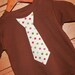 Reviewed by Anonymous reviewed Boys Christmas Red Green Polka Dots Appliqued Tie Shirt - sizes 0-3 months to size 6