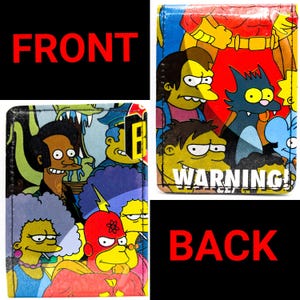 May include: A colorful wallet featuring cartoon characters. The front of the wallet has the word "FRONT" in red. The wallet's design includes various characters in vibrant colors. The back of the wallet has the word "BACK" in red.