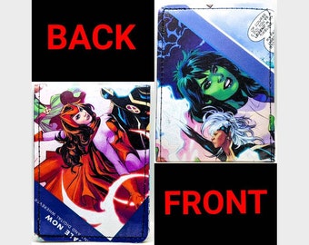 May include: A wallet with a comic book cover featuring a group of female superheroes. The front of the wallet features a green-skinned superhero with long black hair. The back of the wallet features a red-haired superhero with a purple and red costume.