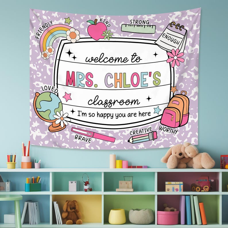 May include: A purple and white classroom tapestry with a welcome sign that says "Welcome to Mrs. Chloe's Classroom." The sign is surrounded by colorful illustrations of school supplies, including a rainbow, a globe, a pencil, a ruler, and a backpack. The tapestry also features the words "Friendly, Kind, Strong, Enough, Loved, Brave, Creative, Worthy".
