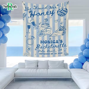 May include: A blue and white striped tapestry with the text "She Found Her Honey" and "Monica's Bachelorette Palm Beach, FL September 25-27, 2025". The design includes illustrations of a disco ball, champagne glasses, a ring, and a honey pot.