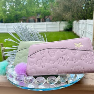 Cartera de mujer con pompones