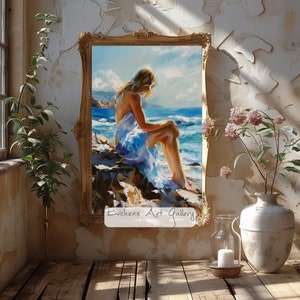 Pu&ograve; includere: Un dipinto di una donna in un vestito blu seduta su una roccia vicino al mare. Il dipinto &egrave; incorniciato in oro e ha il testo "Evchens Art Gallery" in basso.