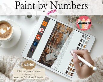 May include: Digital paint by numbers image on a tablet screen. The image is of a fall scene with a window, a book, and a pumpkin. The tablet is on a white surface with a cup of coffee and a knitted blanket.