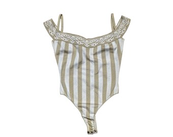 Body de Alaïa de rayas con hombros descubiertos, colección Primavera/Verano 1992, talla grande