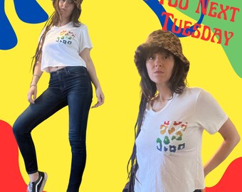 Camiseta con bolsillo y estampado de guepardo