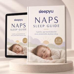 May include: A physical book and a digital tablet display the Sleepyu Naps Sleep Guide, featuring a sleeping baby, a sun icon, and the text A gentle, age-based plan for more predictable daytime sleep for ages 4-24 months on a white cover.