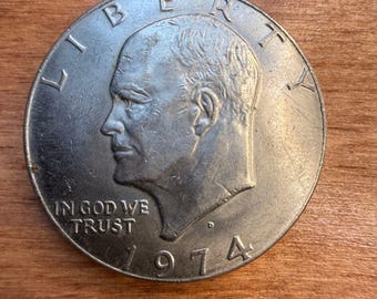 Moneda de dólar Eisenhower "Ike" de 1974-D, circulada, en buen estado