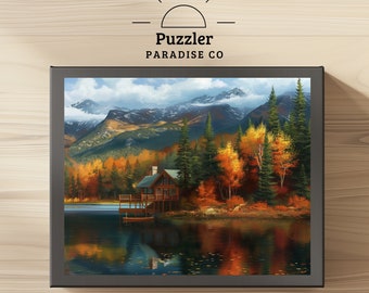 May include: A jigsaw puzzle featuring a scenic autumn landscape with a cabin by a lake. The mountains in the background are covered in snow and the trees are a mix of green, yellow, and orange. The lake is reflecting the colors of the trees and the sky.