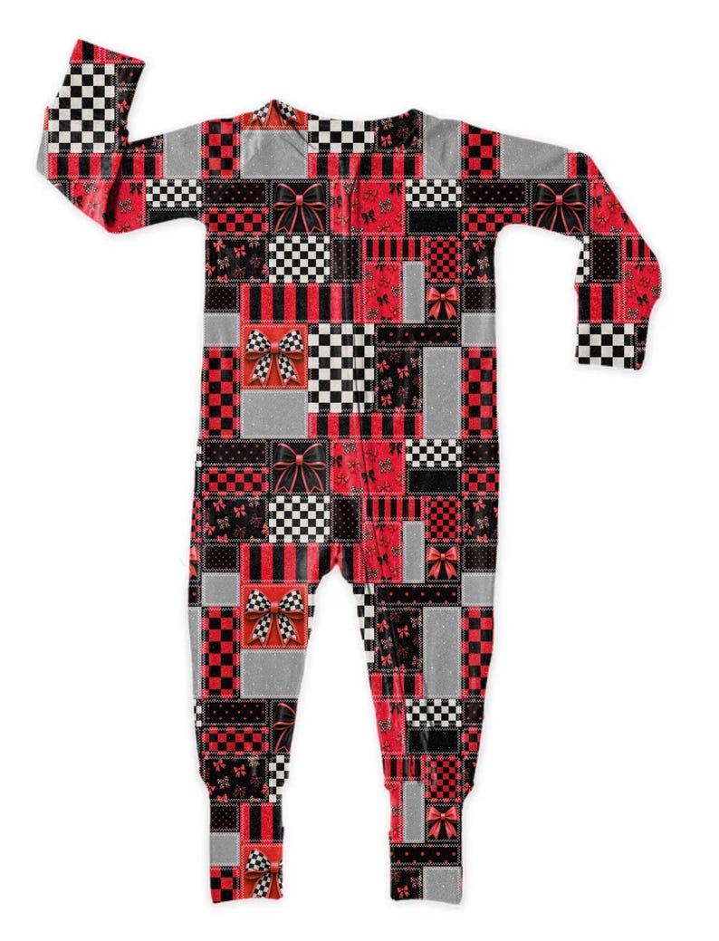 May include: A long-sleeve one-piece romper featuring a patchwork design of red, black, white, and gray squares. The pattern includes checkered prints, vertical stripes, and small bow motifs, with larger decorative bows placed throughout the garment.