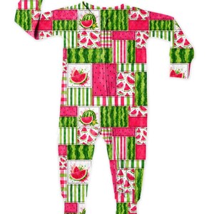 May include: A long-sleeve one-piece sleeper featuring a patchwork design of watermelon-themed patterns. The garment displays alternating squares of pink watermelon flesh, green rind textures, and white stripes, accented with illustrations of watermelon slices.