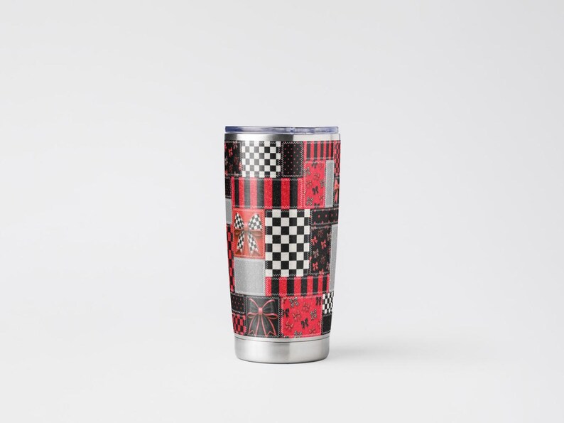 May include: A stainless steel tumbler featuring a patchwork design of red, black, and silver squares. The pattern includes black and white checkered squares, red and black stripes, and red squares decorated with small black bows and butterfly motifs.