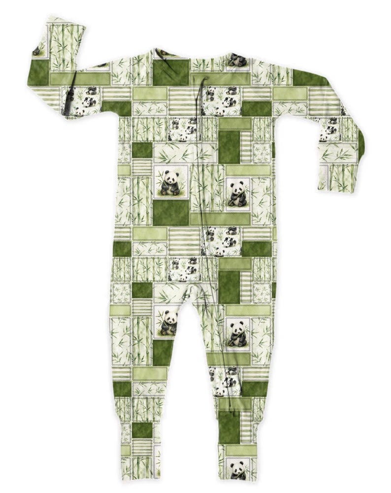 May include: A green and white patchwork pajama set featuring panda bears and bamboo stalks. The one-piece sleepwear has a zipper closure and long sleeves. The design includes various shades of green and white, creating a cozy and playful look.
