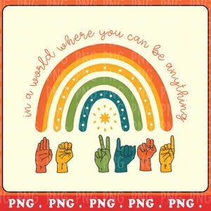 以下が含まれることがあります： レトロなフォントで「in a world where you can be anything」というテキストが書かれたカラフルな虹。アメリカ手話で「信じる」という単語をサインしている5つの手が見えます。