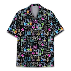 May include: Black button-down shirt with a vibrant, all-over print of colorful laboratory glassware, beakers, and chemical formulas. The design features neon-like colors against a black background, creating a science-themed aesthetic.