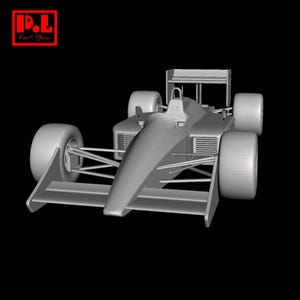 May include: A gray, three-dimensional model of a Formula 1 race car. The car features large tires, a low-profile design, and a prominent front wing. The text "P.L. For You" is in the top left corner.